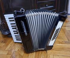 Harmonika 32 basa Weltmeister-stella