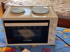 Prodajem ne korišćenu mini pećnicu