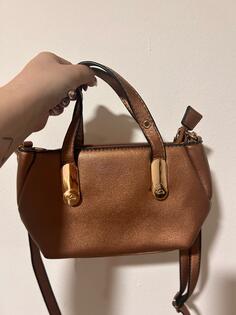 Carpisa torbica, nikad nosena