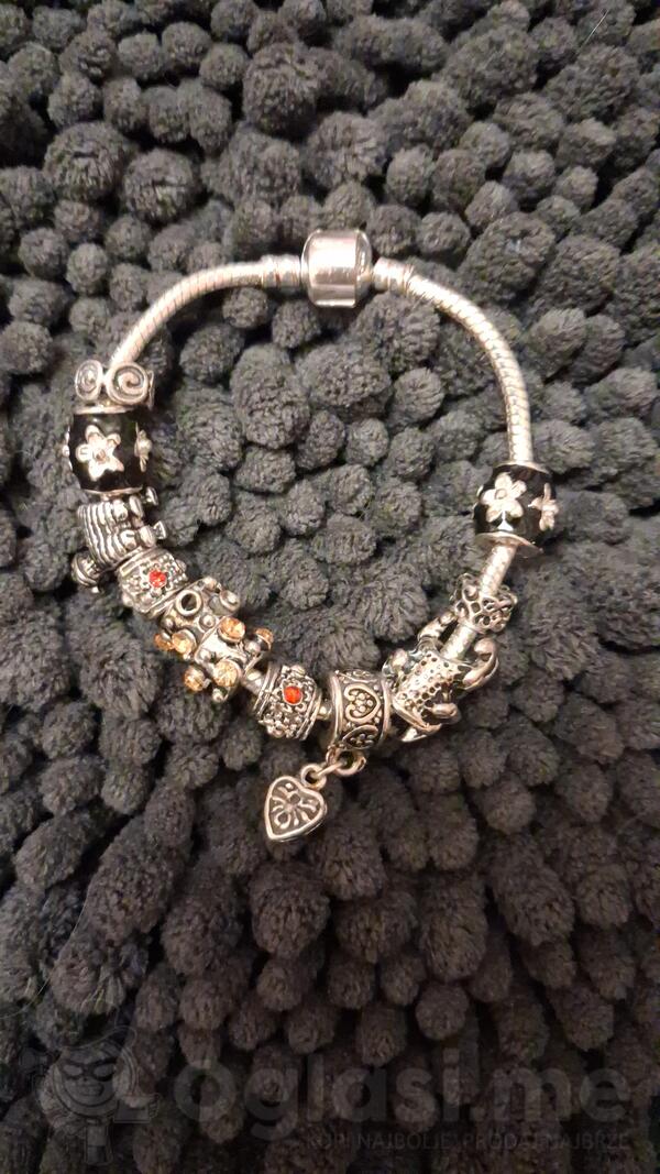 Srebrna narukvica 31 gr 10 privezaka