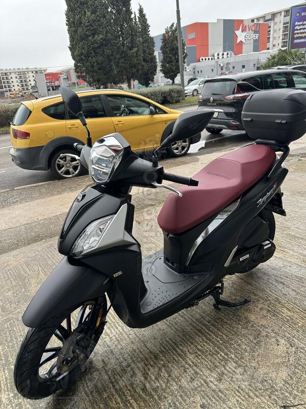 SYM - 2025