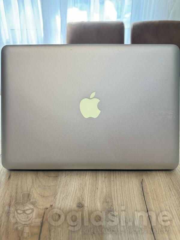 Apple  - 13.5" Intel i5 4GB GB